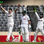 Azan Awais celebrates his maiden Test fifty during the first Test between Pakistan and Bangladesh in Mirpur.