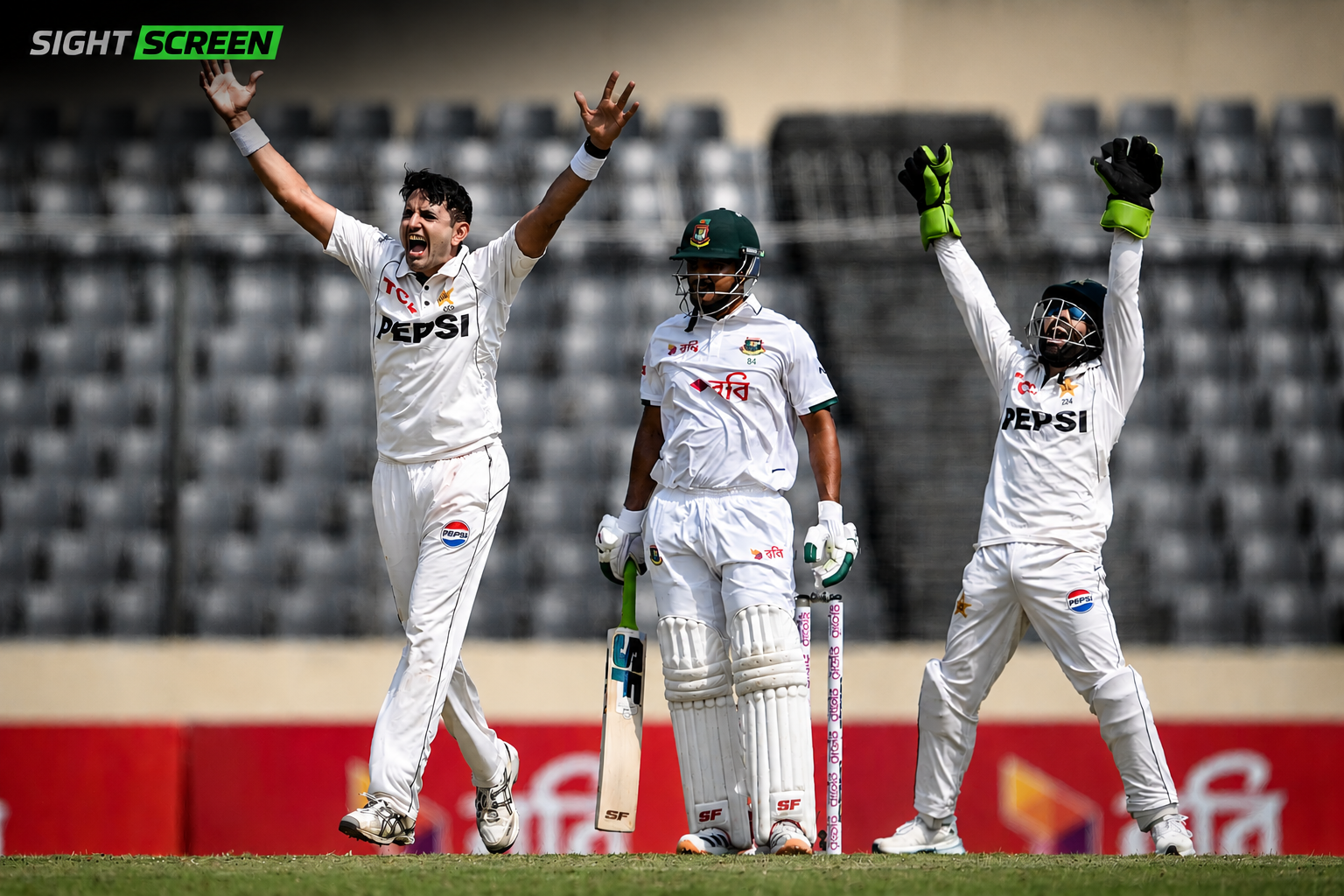 Azan Awais celebrates his maiden Test fifty during the first Test between Pakistan and Bangladesh in Mirpur.